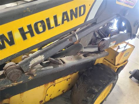 new holland skid steer l225 hydraulic cylinder|new holland l225 skid loader.